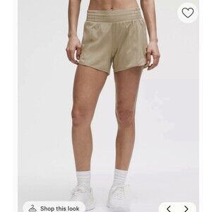 Lululemon Hotty Hot High-Rise Lined Shorts 4'' in a light beige size 12